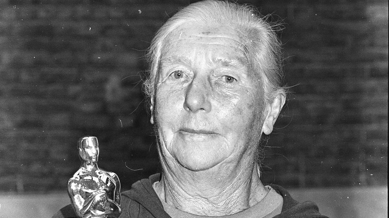 Josie MacAvin posing with Oscar