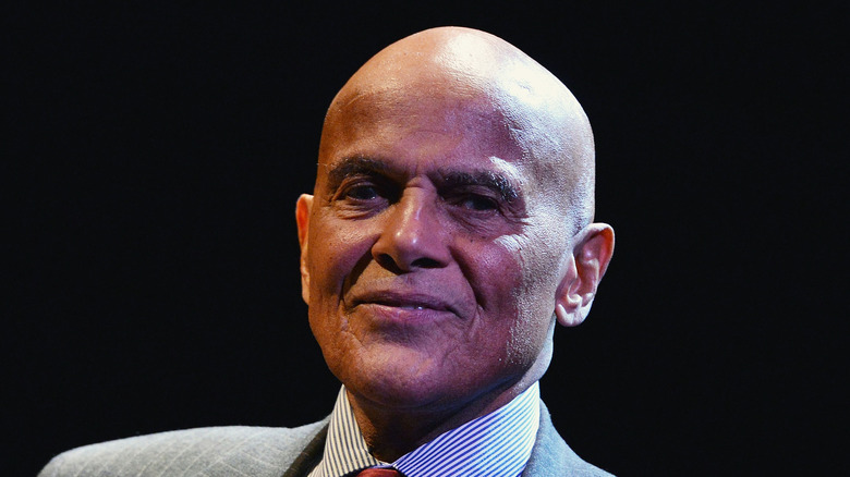 Harry Belafonte smiling black background