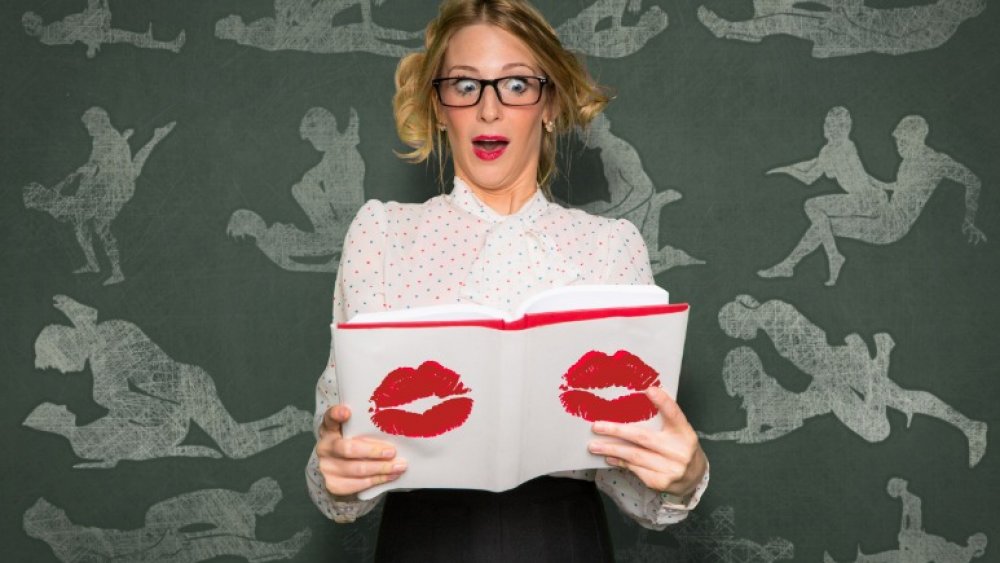 Woman reading sexy book