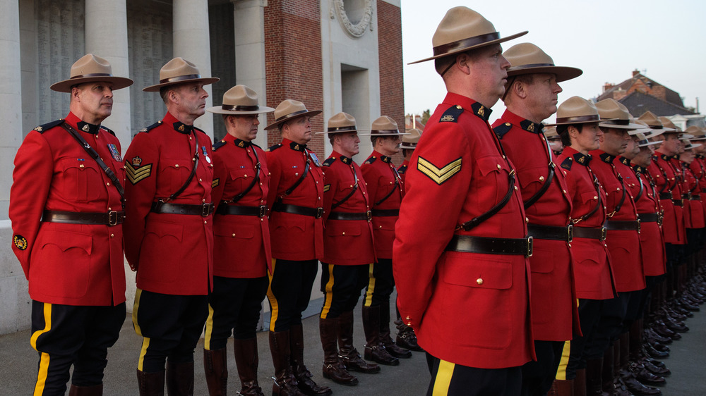 Royal Canadian Mounted Police parade following the Last Post ceremony in front of the Menin Gate Memorial to the Missing on April 6, 2017 in Ypres, Belgium.