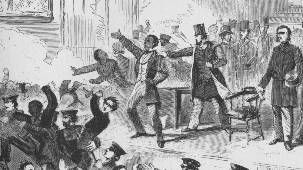 William Lloyd Garrison trying to hold abolitionist meeting in Boston
