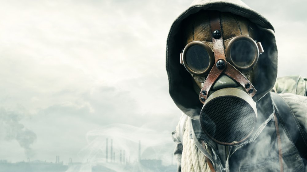 Poison gas and person in mask