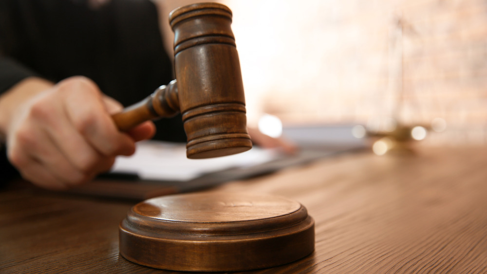 hand with gavel
