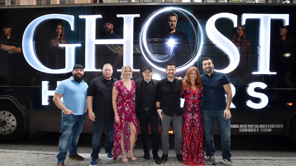 The Ghost Hunters crew in front of tour bus