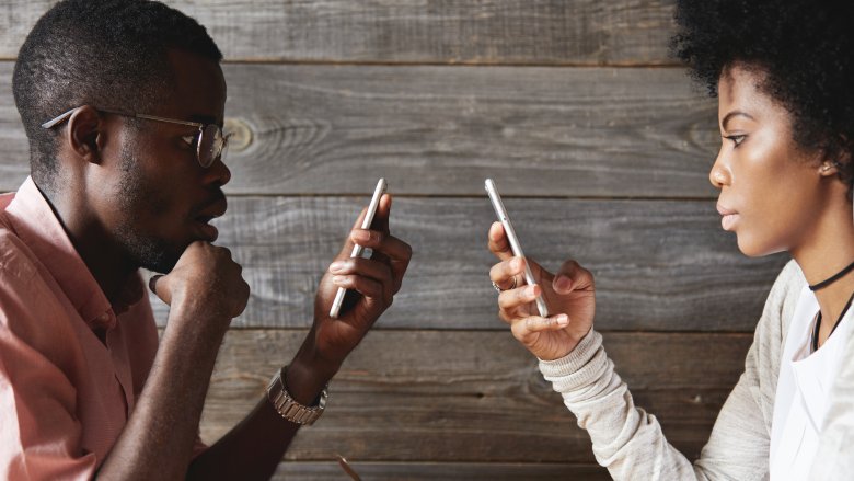 couple obsessed with social media