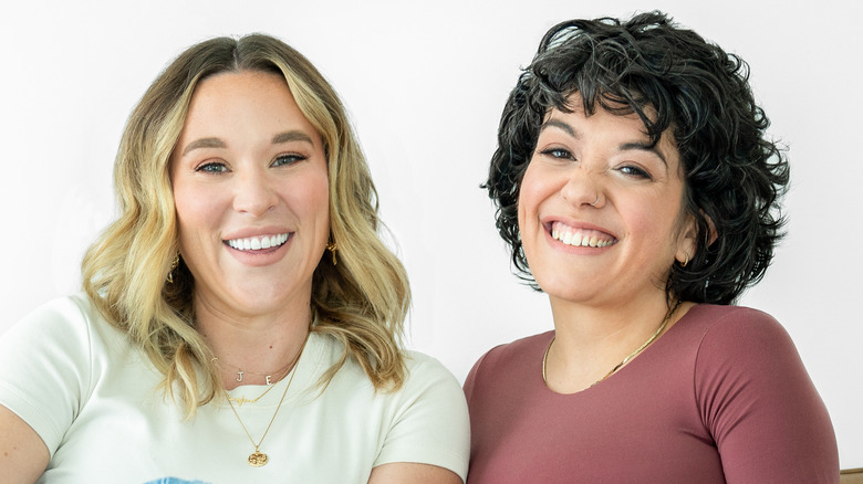 Ashley Flowers and Brit Prawat smiling