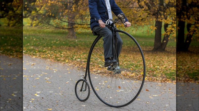 A cyclist on a penny farthing