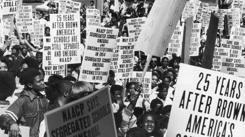 Civil rights protestors holding dozens signs