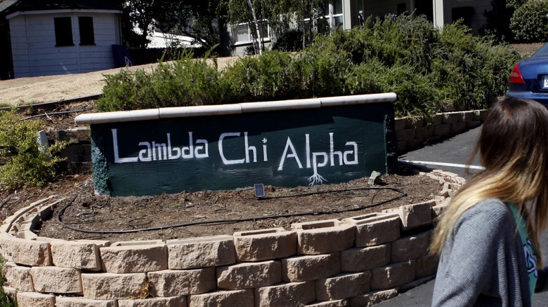 Lambda Chi Alpha sign in mulch bed