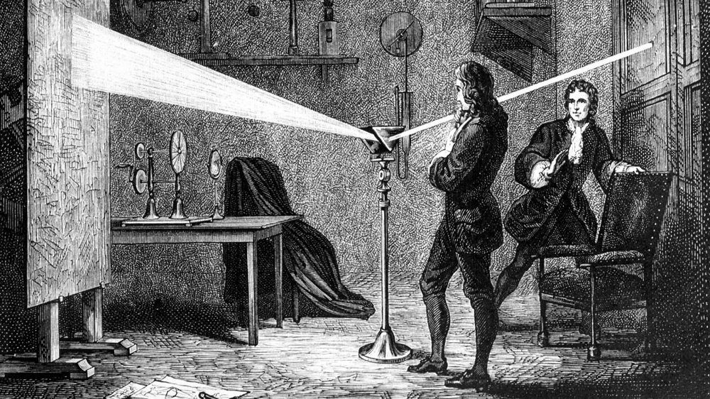 Isaac Newton experimenting with a prism