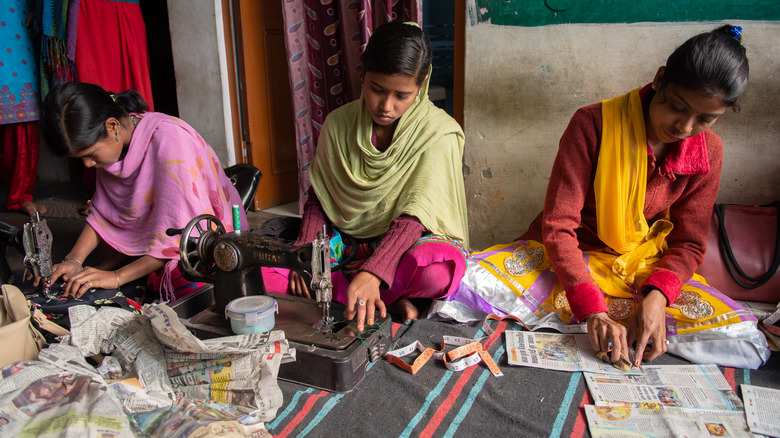 Women sewing in India