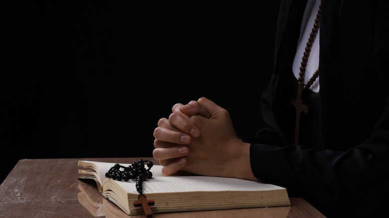 A nun in prayer