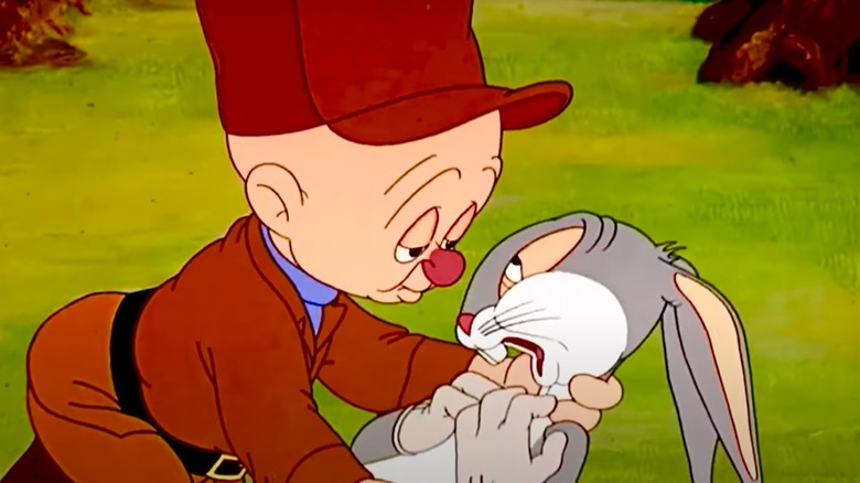 Bugs Bunny faking death to Elmer Fudd