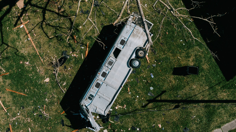 Crashed bus on side 