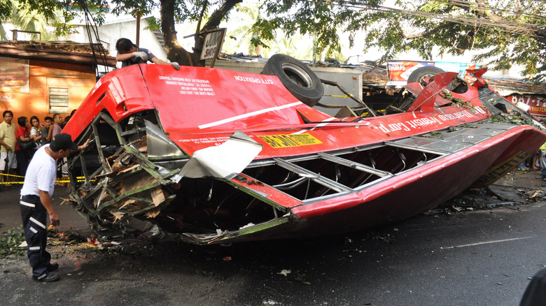 flattened red bus