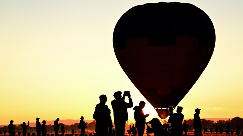 balloon and people silhouette