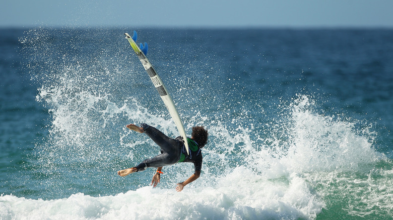 surfer wipeout midair falling