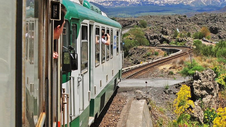 train tracks in Italy car mountains
