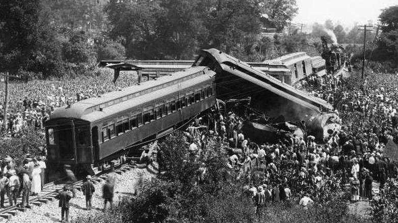 two train cars derailed on top of each other