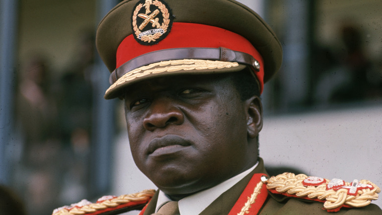 Idi Amin looking solemn in military uniform