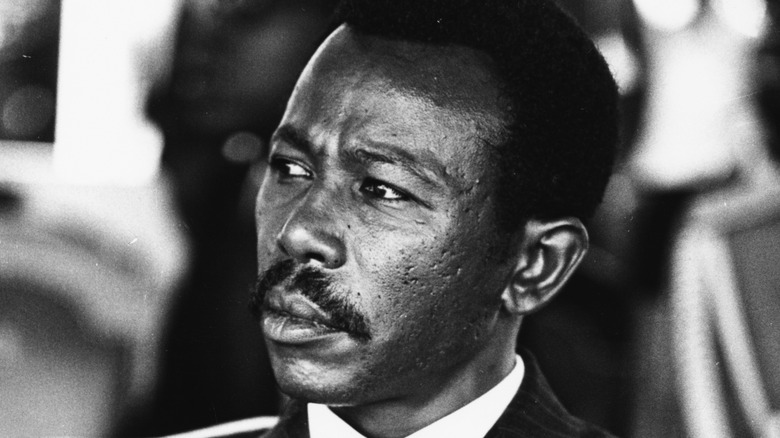 Mengistu Haile Mariam sat in suit with moustache looking to his right