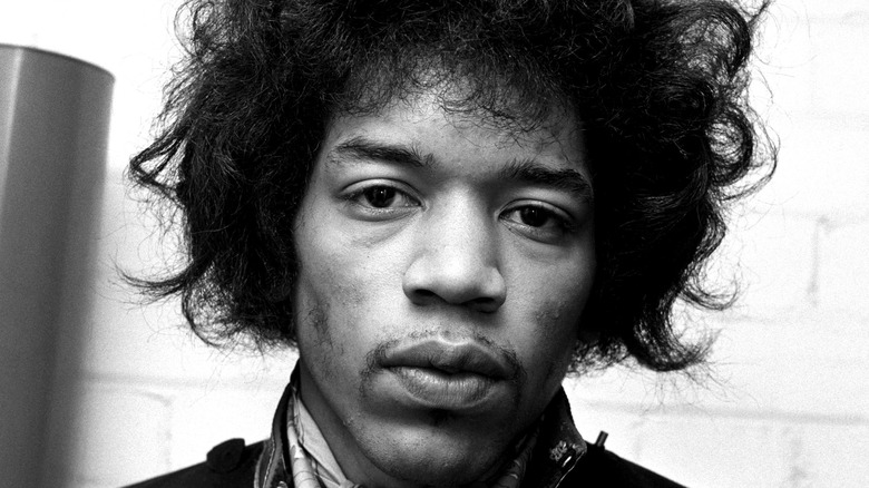 Jimi Hendrix posing for portrait