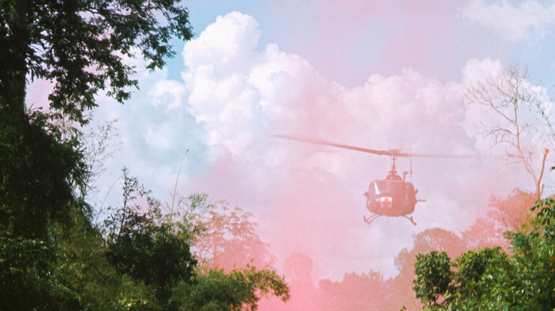 helicopter in pink cloud