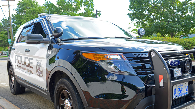 Police cruiser parked on street