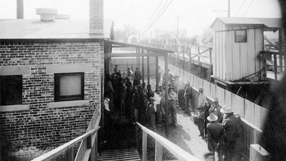 El Paso Disinfection station and Mexicans Waiting at the international bridge