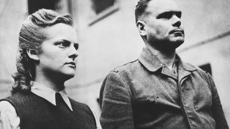 Irma Grese, Josef Kramer standing guard