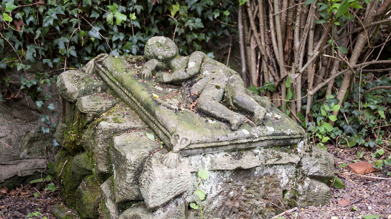 stone child on grave marker
