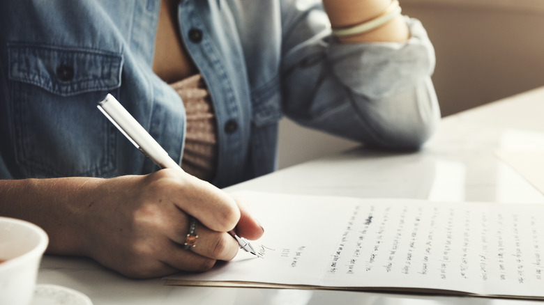 Woman writing letter