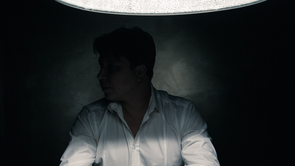 Unseen man being interrogated