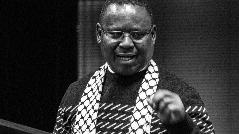 Frank Chikane patterned sweater stood speaking
