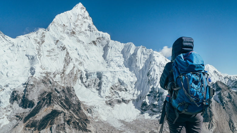 mountain climber on snow-capped mountain