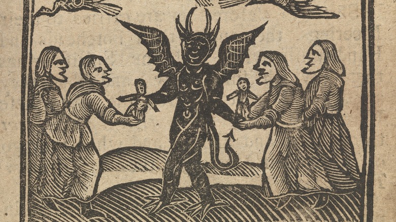 Wax dolls being given to the devil