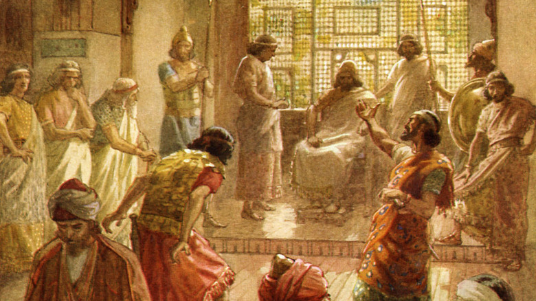 Rehoboam sits on throne as king of Judah after split with Israel.
