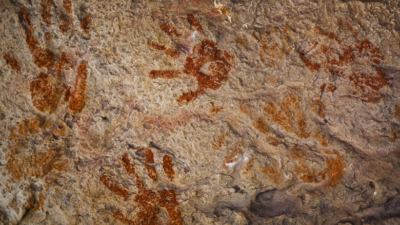 ancient hand prints in clay