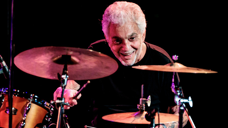 Steve Gadd smiling while playing drums
