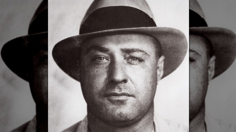 A black and white photo of George "Machine Gun" Kelly