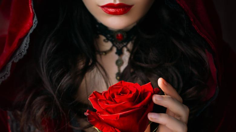 Lady vampire holding a rose