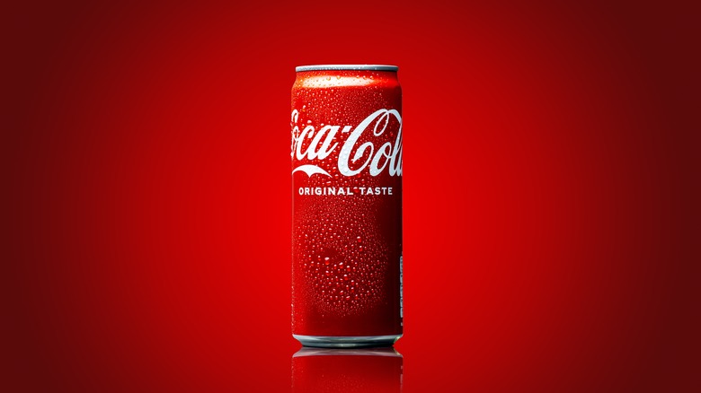 Coke against red background