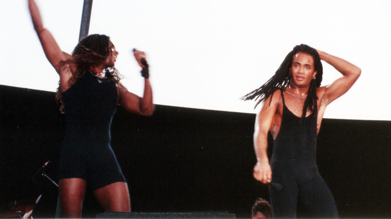 Milli Vanilli arms up on stage