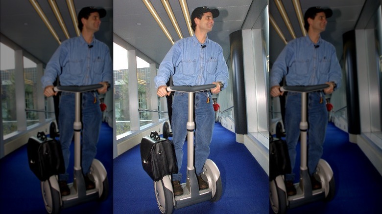 Segway creator riding one
