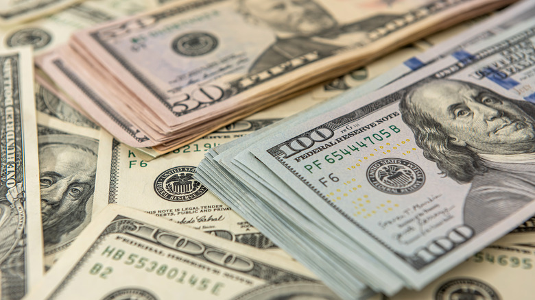 American currency, including $50s and $100s