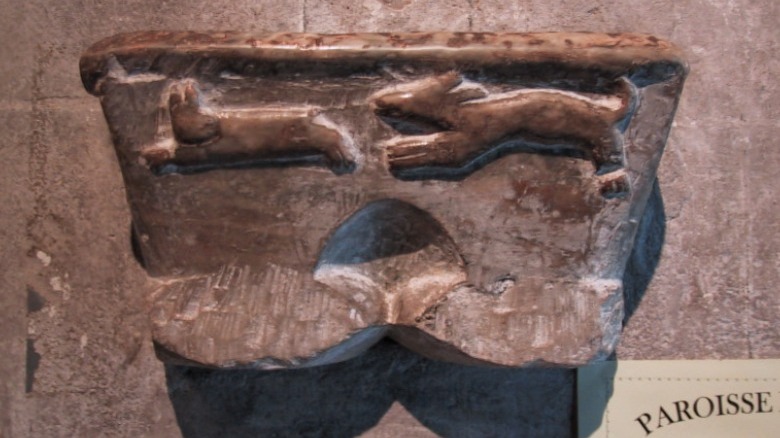 Holy water font for Cagots