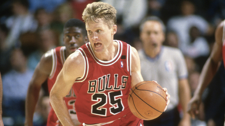 Steve Kerr of the Chicago Bulls dribbling the ball in a game