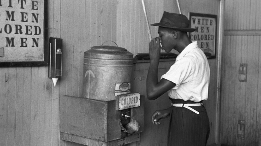 Drinking at segregated fountain