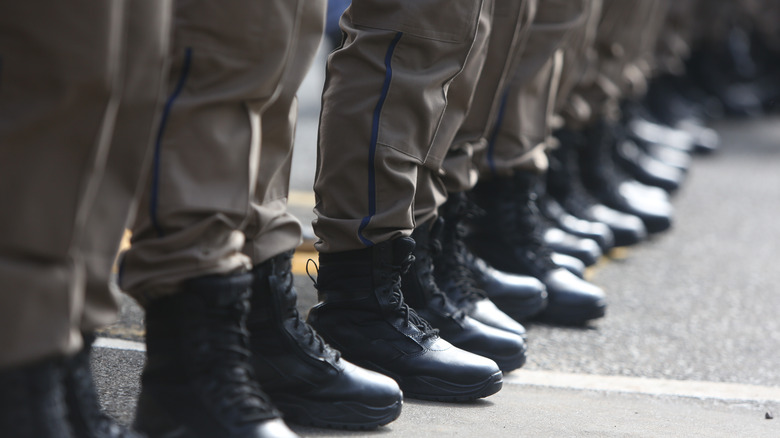 Line of police boots