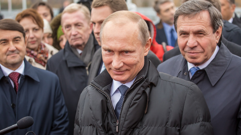 Vladimir Putin smirking